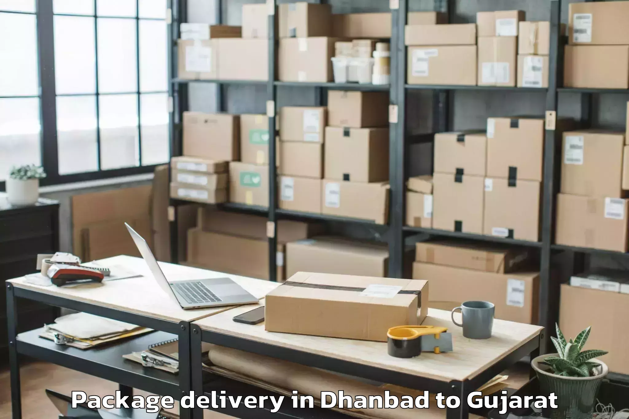 Quality Dhanbad to Lunavada Package Delivery